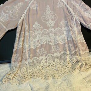 Lacy pink blouse with ecru trim
